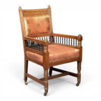 E. W. Godwin. An Aesthetic Movement Carved Oak Armchair with Ebonised Spindles - Thumbnail 1